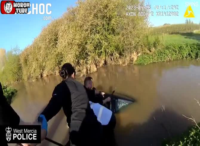 Video :A lady stranded in a flooded automobile was heroically rescued